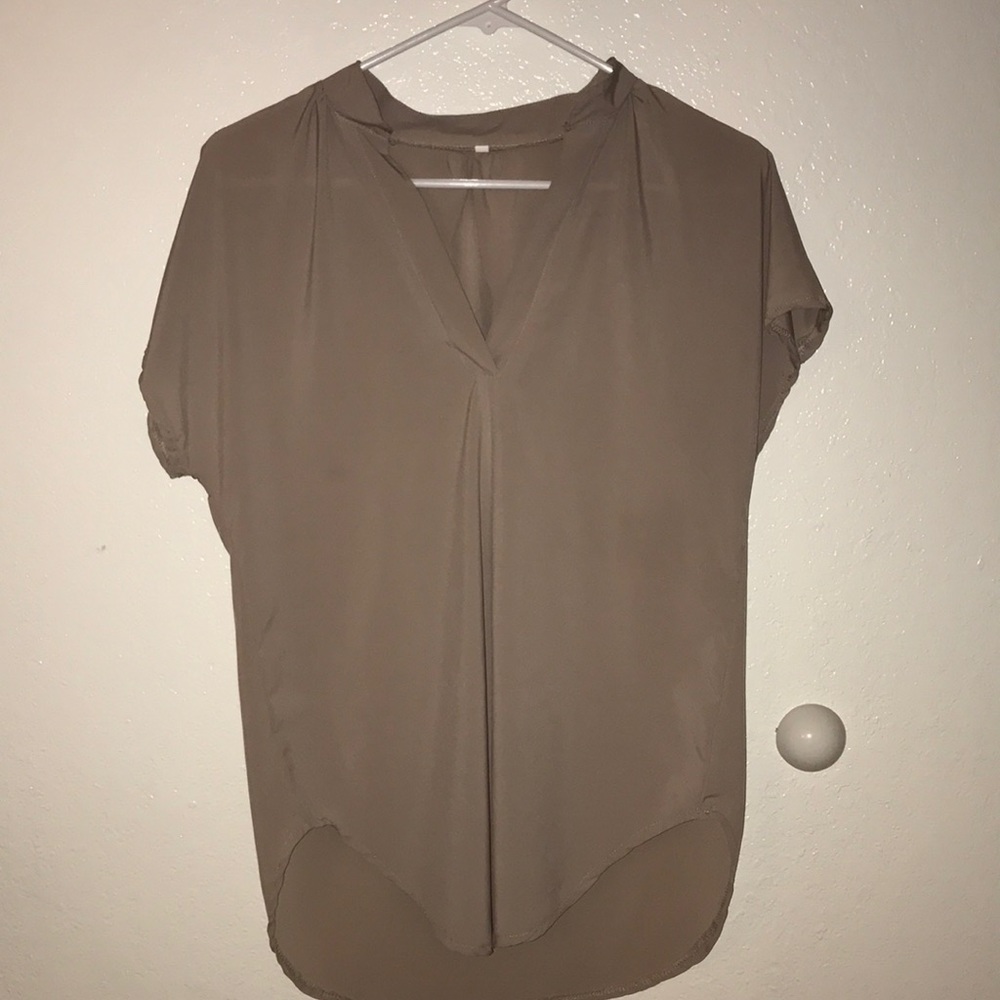 Size sm. Short sleeve silky smooth tan blouse!